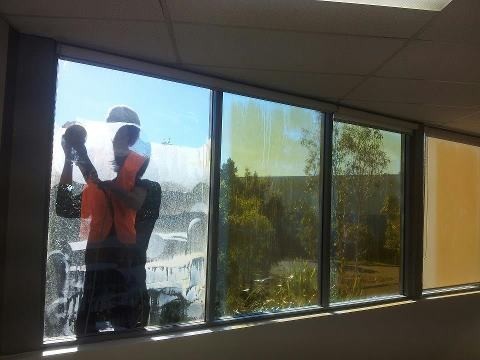Cleaning of windows which suffer from ugly brown bore water stain showing what a difference the result is
